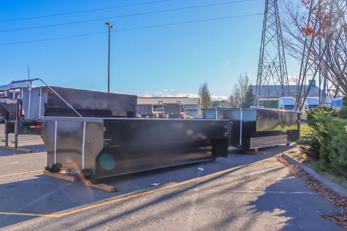 Roll-off dumpster ready for waste disposal at job site for 12 Yard Dumpster Rental in Newnan